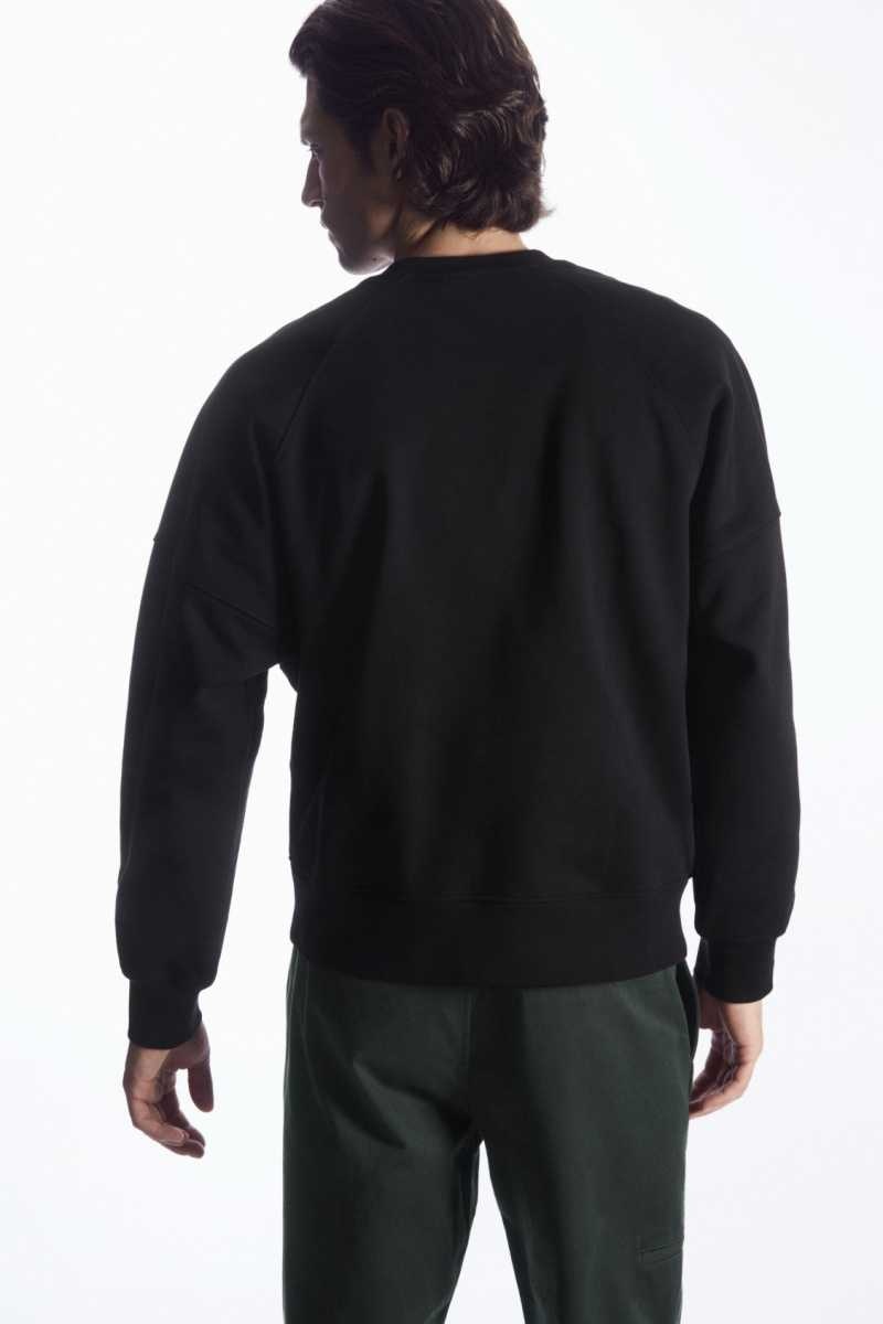 Black Men's COS Oversized Exposed-Seam Sweatshirts | 572306URL